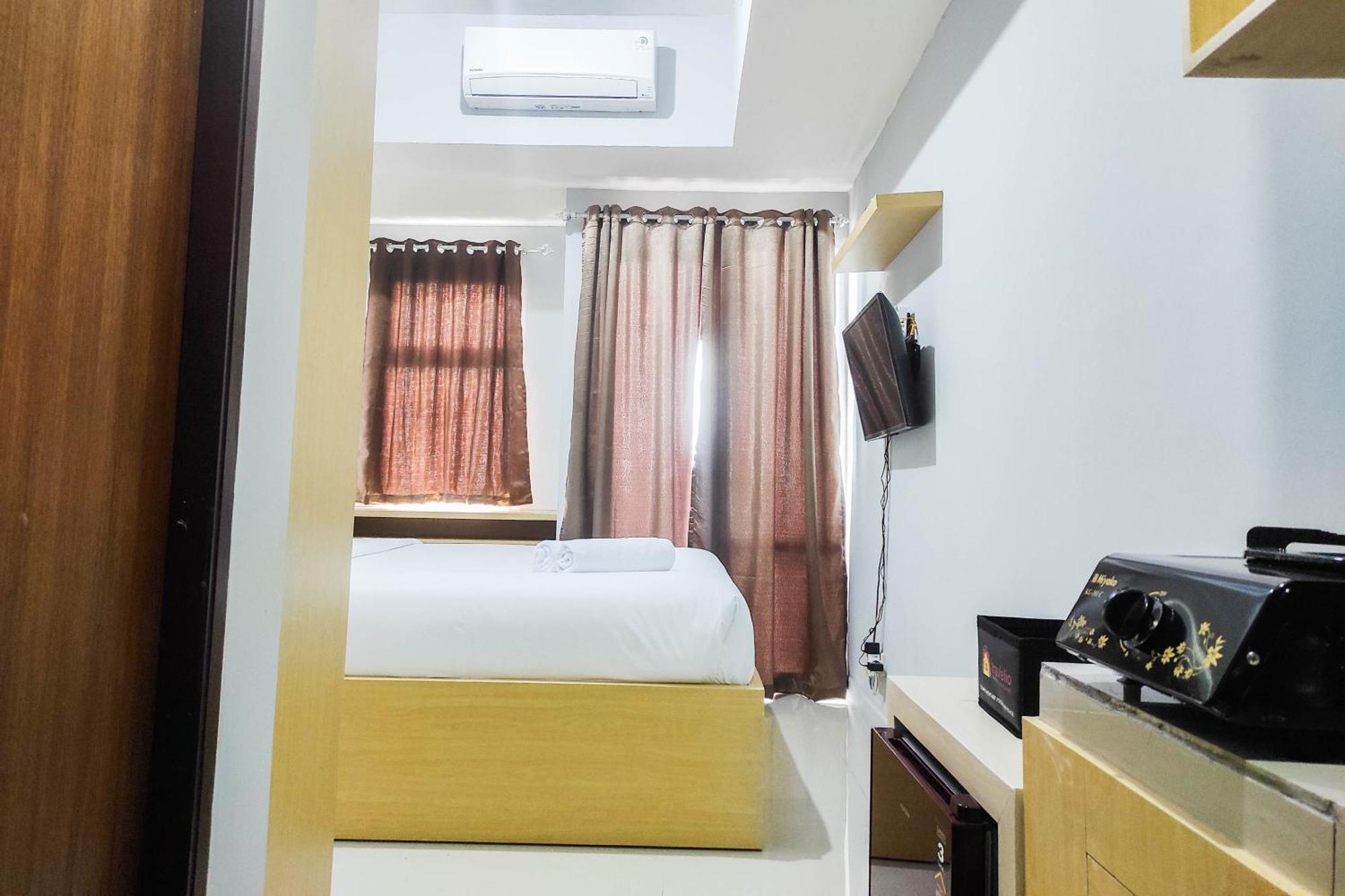 Comfy And Minimalist Studio At Vida View Apartment By Travelio Pampang Exteriör bild