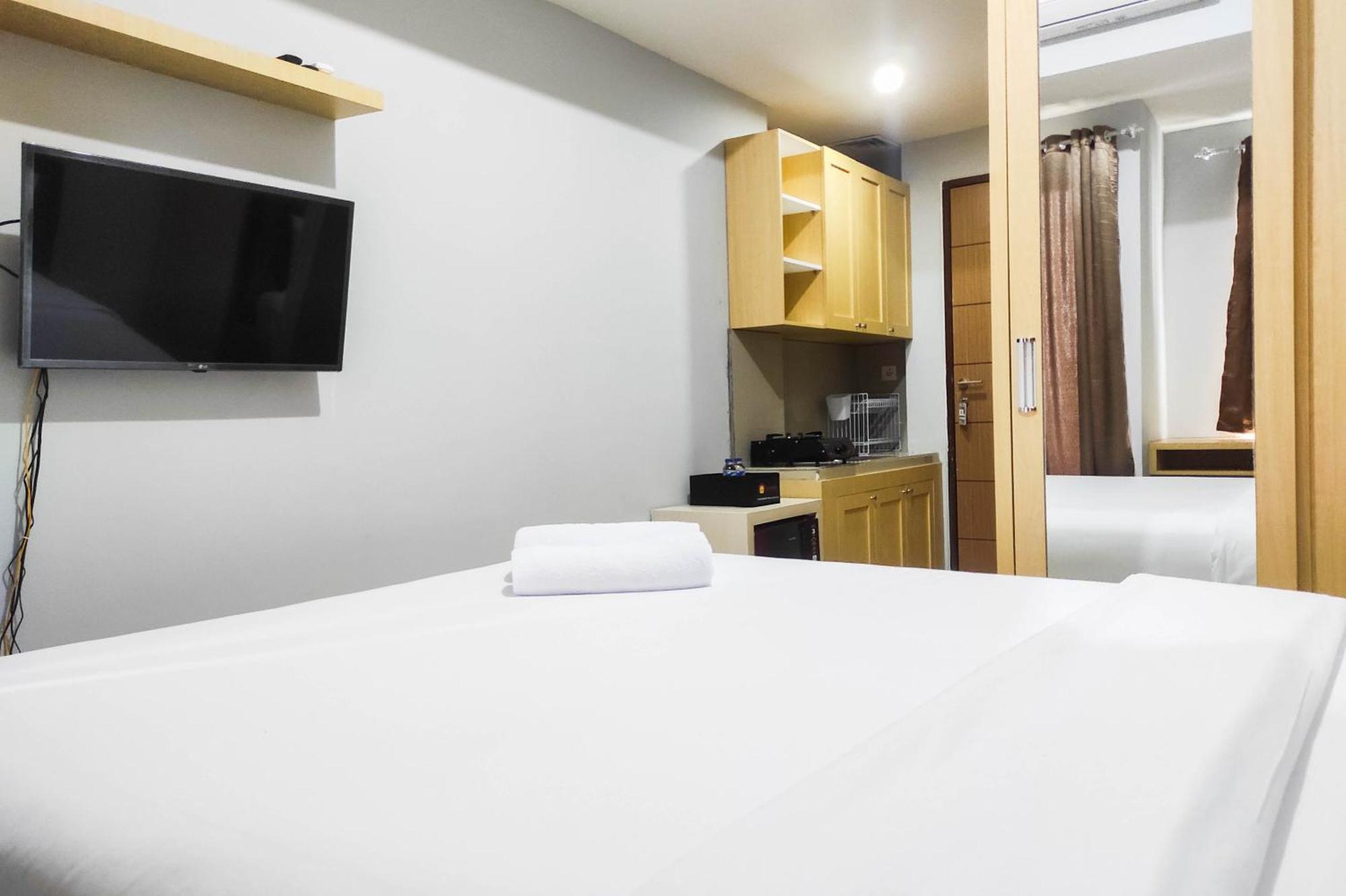 Comfy And Minimalist Studio At Vida View Apartment By Travelio Pampang Exteriör bild